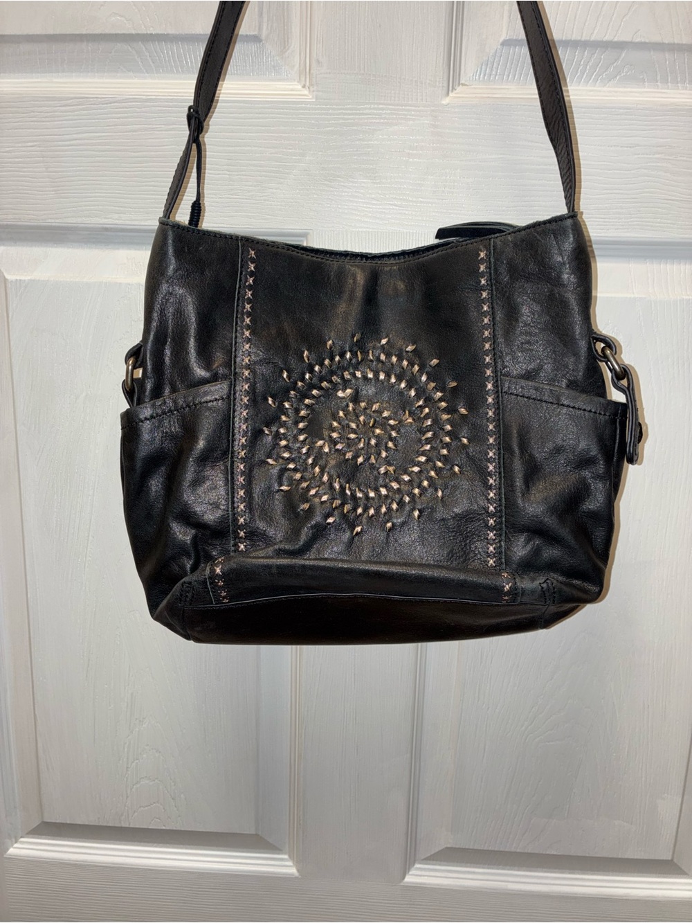 The Sak Black Leather Shoulder Bag with Spiral Stud Detail and